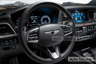 Illustration for article titled Genesis G80 Sport, The Blue Seated Carbon Fiber Trimmed Gold Stiched Steering Wheel Twin-Turbo Sedan All Three Of Us Have Been Waiting For...